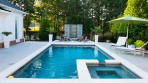 Custom saltwater pool with spa and water feature built by SFC Pool Corp in Southwest Florida